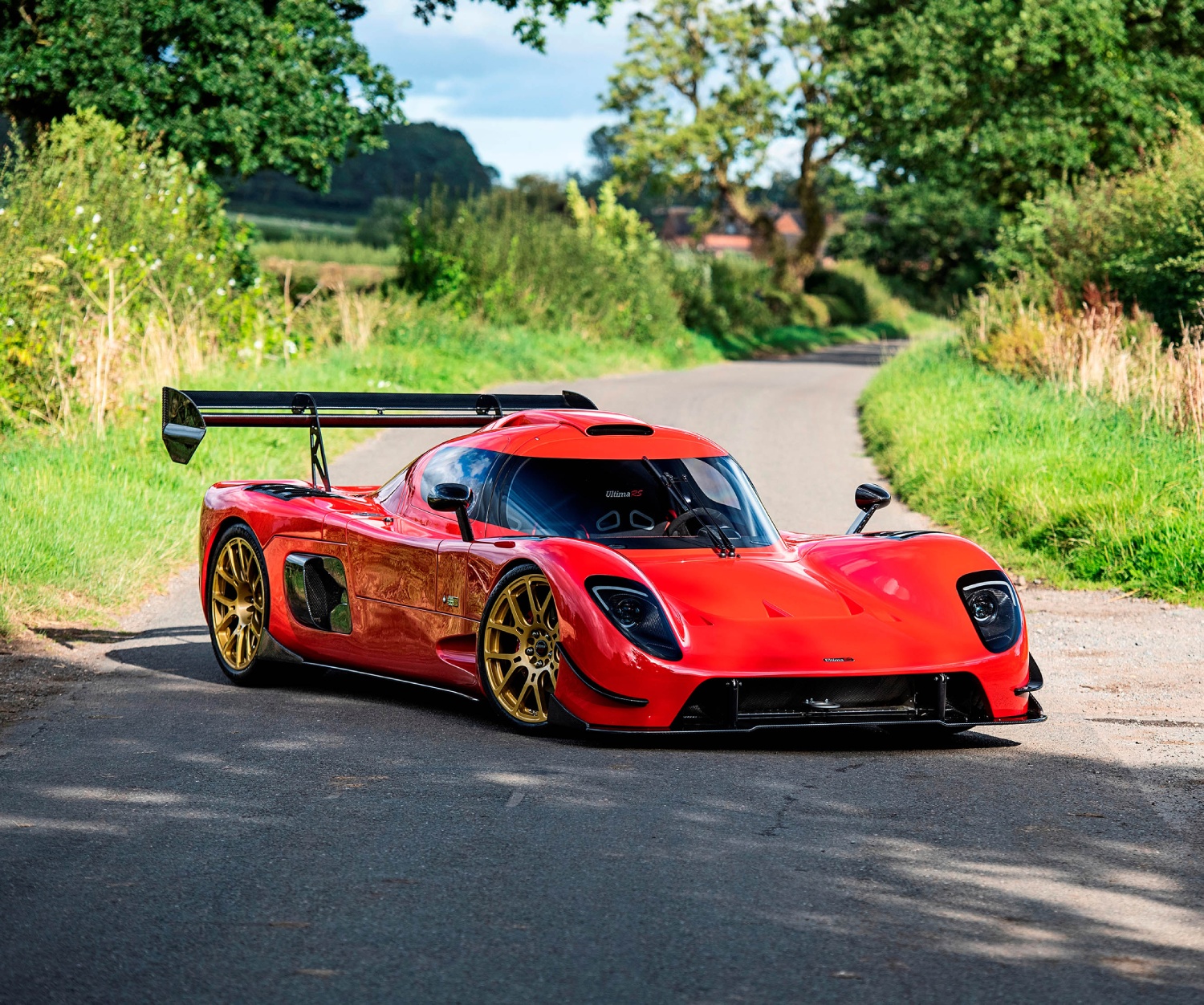 Red Ultima RS Gold Wheels